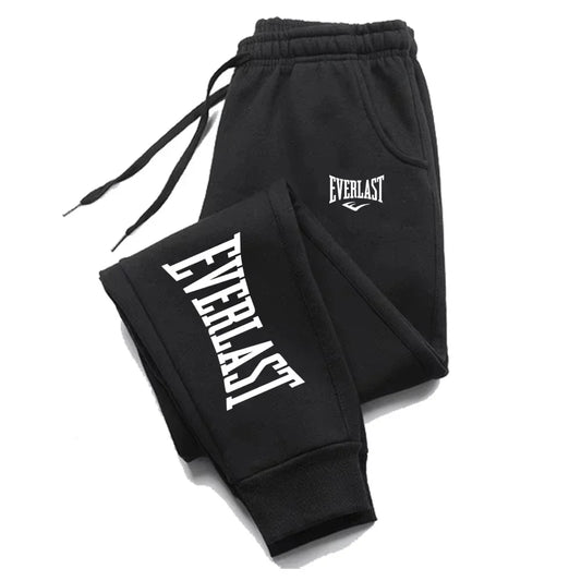 Black sweatpants with white "Everlast" logo on the leg and hip, featuring a drawstring waist.